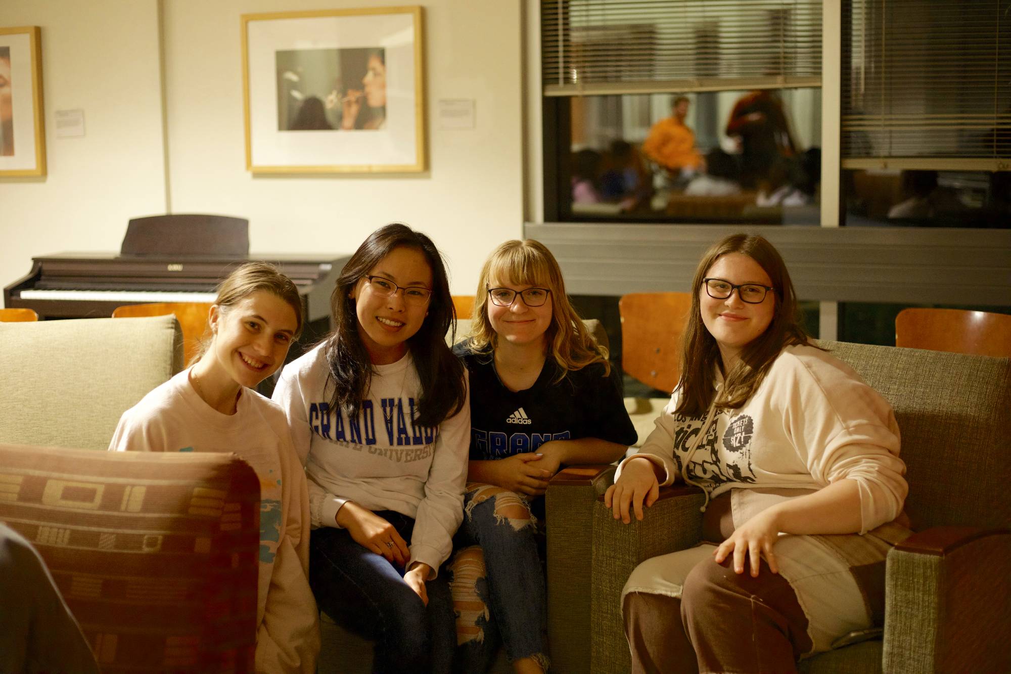 Students smiling and connecting at the event